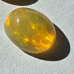 Dazzling yellow welo fire opal stone samples